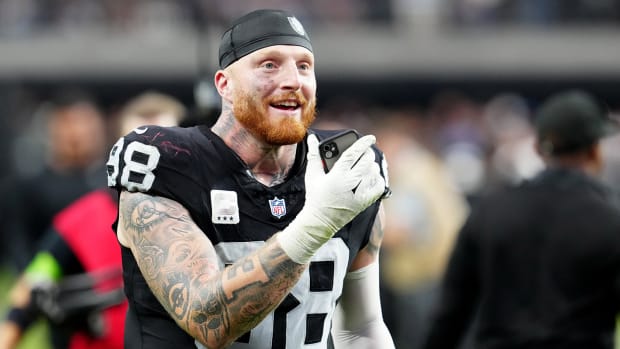 Las Vegas Raiders defensive end Maxx Crosby (98) celebrates after the Raiders defeated the New England Patriots 21-17 at Allegiant Stadium.